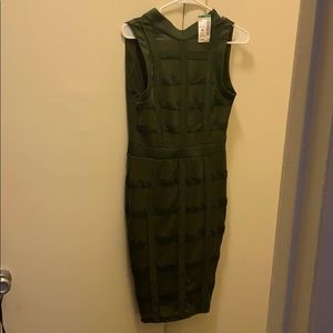 A green block dress with tags !